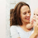 brushing a baby's teeth